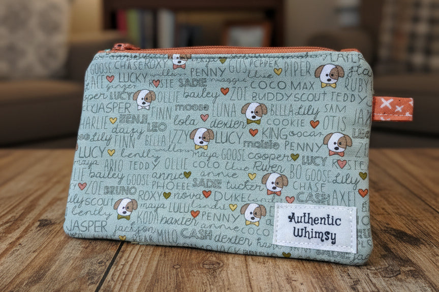 Fabric pouch with dog pattern and text