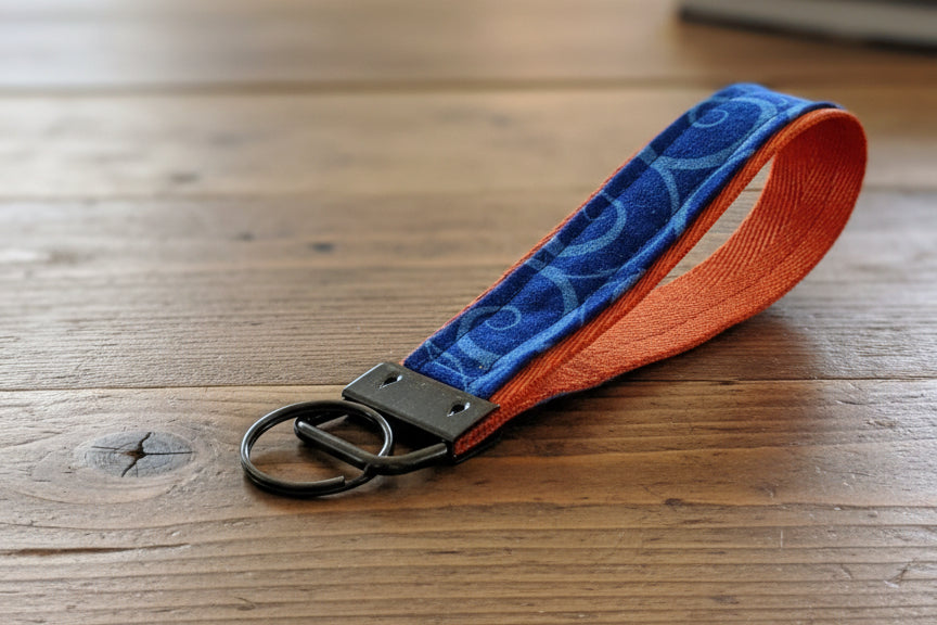 Keychain with blue patterned strap