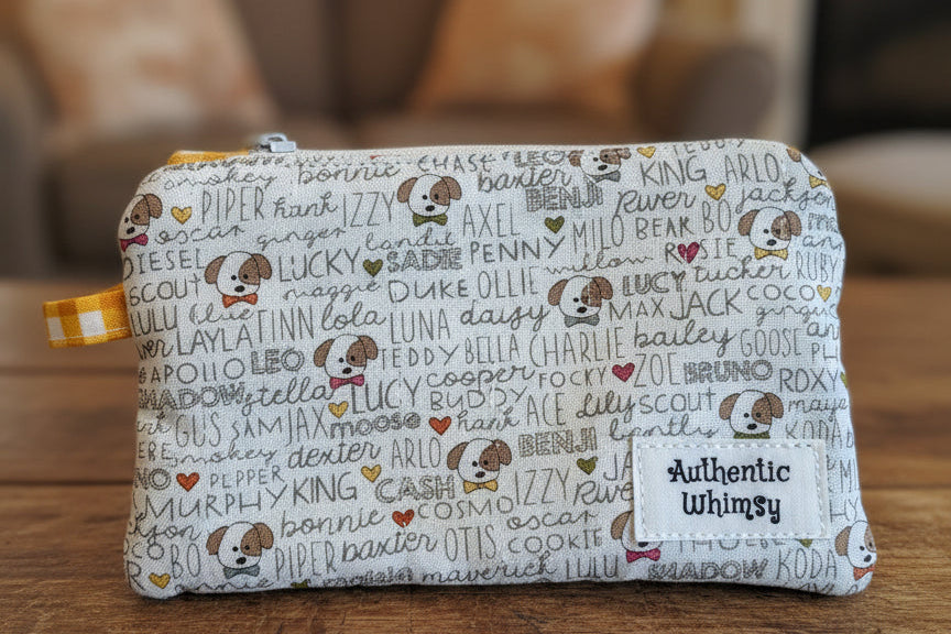 White fabric zipper pouch with dogs and dog names