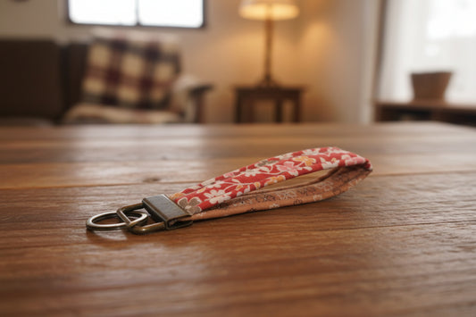 Floral patterned keychain with antique brass hardware