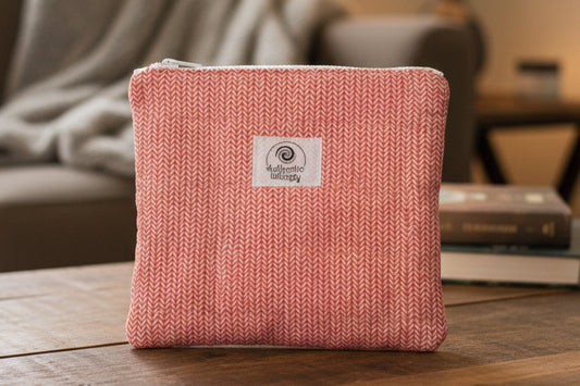 Pink herringbone patterned pouchbackground