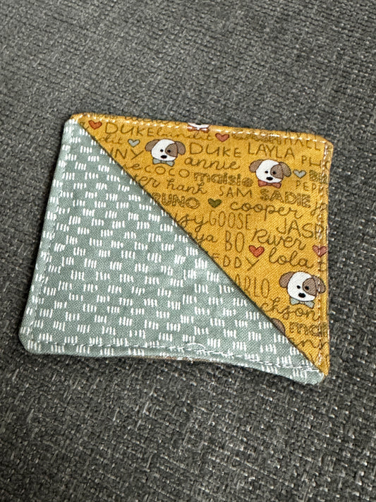 Fabric square with cartoon character pattern on a textured surface