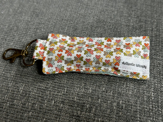 Lip Balm Holder - Multi-Color Clover Fabric with Blue Interior
