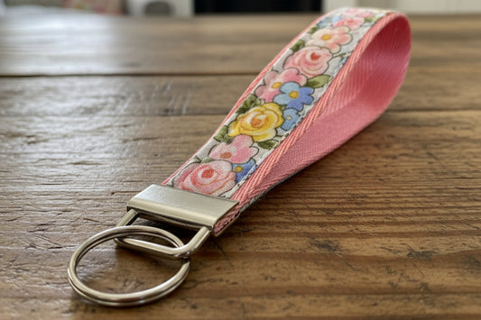 Floral keychain with pink strap
