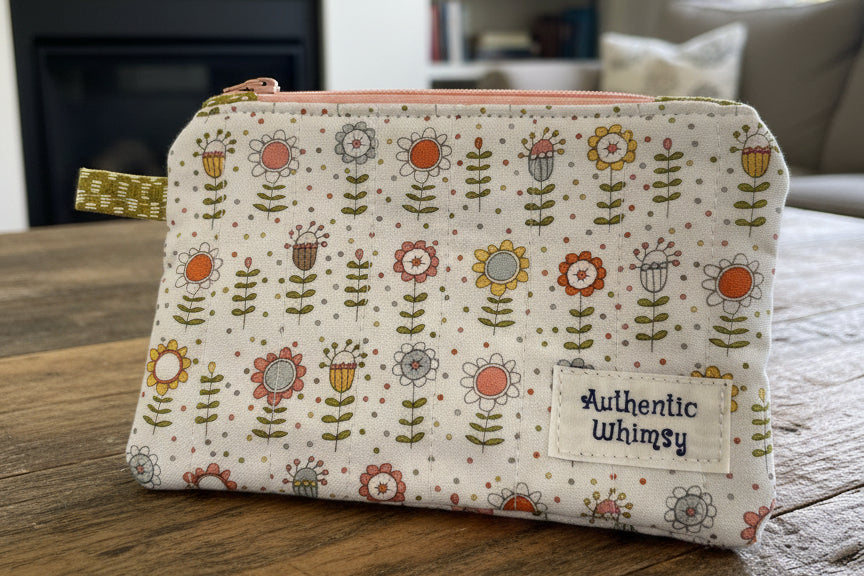 Zipper pouch with white floral pattern